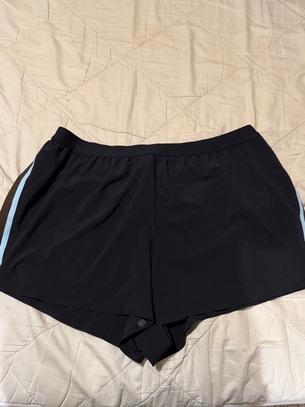 Women’s LuluLemon Black Active Shorts with Light Blue Side Stripe